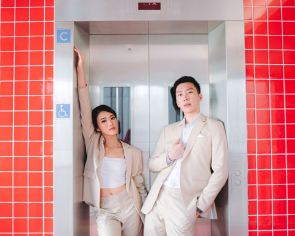 Red (lift) wedding? Couple pose for their photo shoot at viral red HDB block
