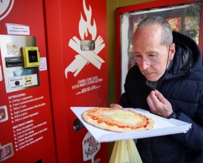 Pizza vending machine prompts curiosity and horror in Rome