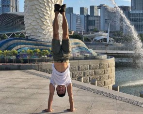 Ex-sniper is handstand-ing his way around Singapore... and into his 50s