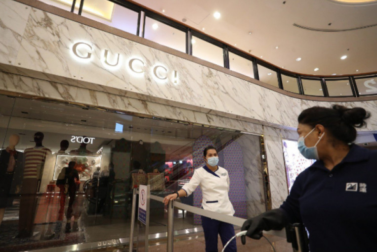 Gucci shop in Hong Kong closes for disinfection after 3 staff catch ...